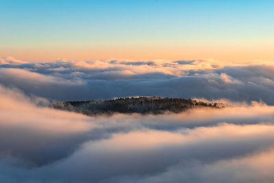 Low angle view of clouds in sky during sunset