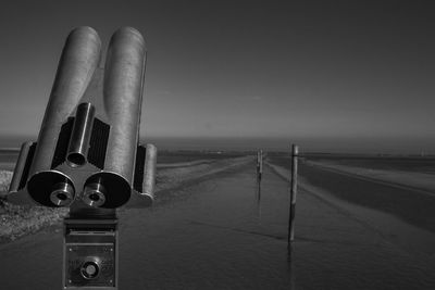 Close-up of coin-operated binoculars against clear sky