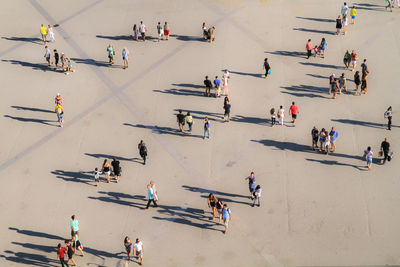 High angle view of people walking on street