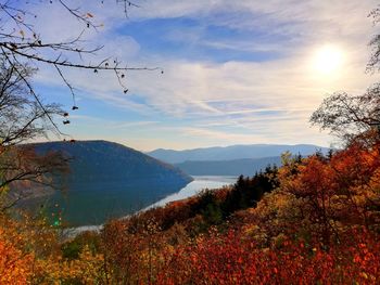 Scenic view of lake against sky during autumn