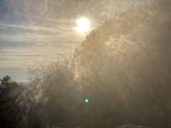 Scenic view of field against sky during sunset