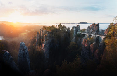 Scenic view of mountains against sky during sunset