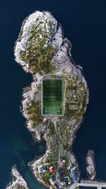 View on a soccer pitch on an island from above