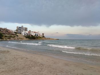 Scenic view of beach against sky