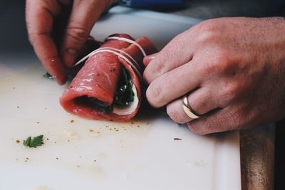 Close-up of person preparing food