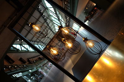 Low angle view of illuminated light bulb