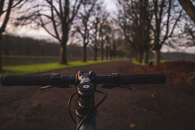Close-up of bicycle on field