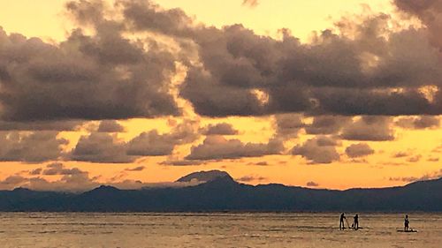 Scenic view of landscape against sky during sunset