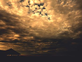 Scenic view of dramatic sky during sunset