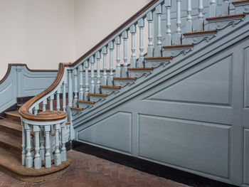 High angle view of staircase by city against sky