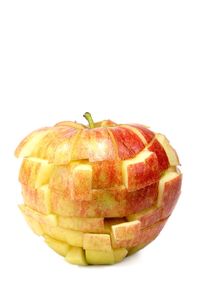 Close-up of fruit over white background