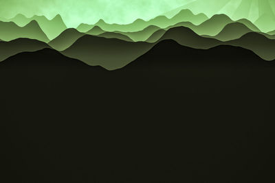 Scenic view of silhouette mountains against clear sky