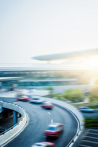 Blurred motion of highway against sky in city