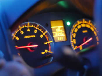 Close-up of clock in car