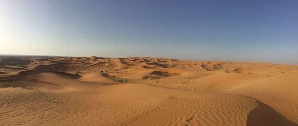 Scenic view of desert against clear sky