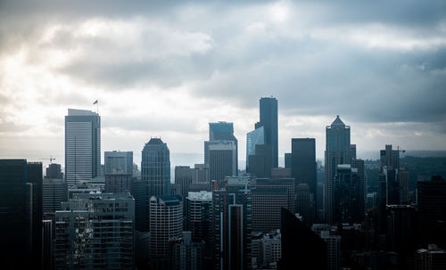 Modern buildings in city against sky