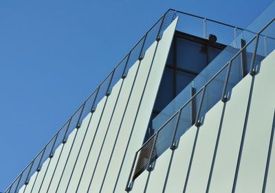 Low angle view of built structure against blue sky