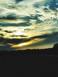 Scenic view of silhouette landscape against sky during sunset