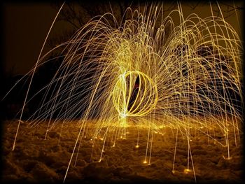 Firework display at night