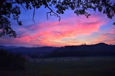 Scenic view of silhouette landscape against sky during sunset