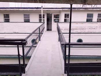 Empty staircase of building in city during winter