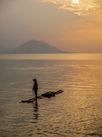 Scenic view of sea at sunset