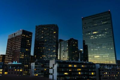 Low angle view of illuminated building at night