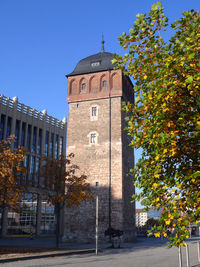 Low angle view of building against clear blue sky