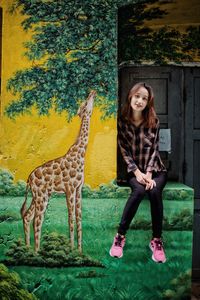 Portrait of smiling young woman outdoors