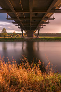 View of bridge over river against sky