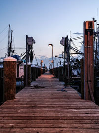 Pier against sky at dusk