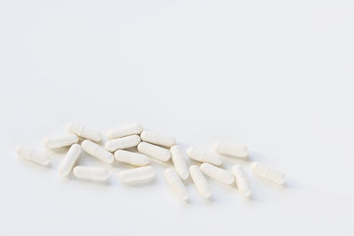 Capsule pill on white background, supplement concept