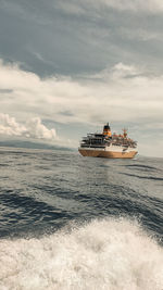 Boat in sea against sky