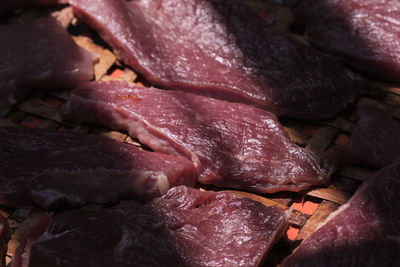 Close-up of meat on barbecue grill