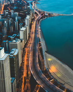 High angle view of light trails on road at night