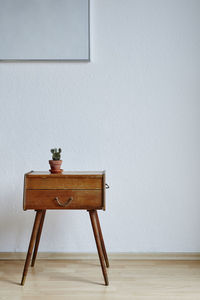 Empty chair on table at home