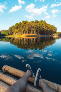 Low section of woman relaxing in boat