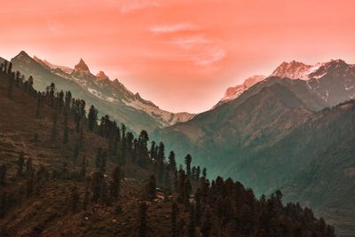 Scenic view of mountains against sky during sunset