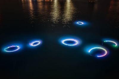 Close-up of illuminated lights in water