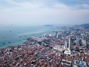 Aerial view georgetown heritage city. back is penang bridge.