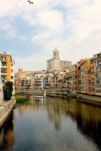 View of canal with buildings in background