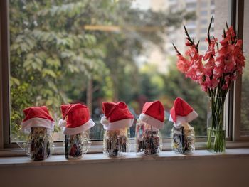 Close-up of red flowers on table