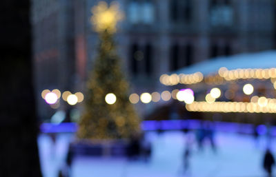 Defocused image of illuminated lights at night