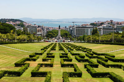 View of garden with buildings in background