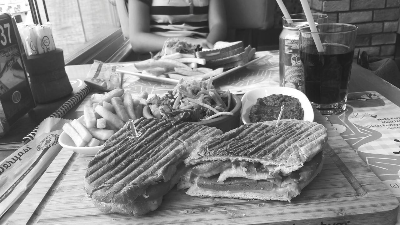 indoors, food and drink, table, food, freshness, still life, chair, high angle view, healthy eating, absence, restaurant, variation, no people, bread, day, close-up, plate, ready-to-eat, incidental people