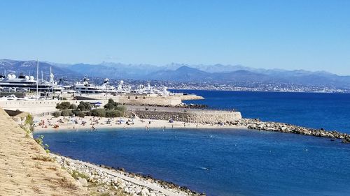 Scenic view of sea against blue sky