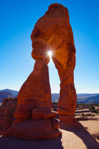 Rock formation against blue sky