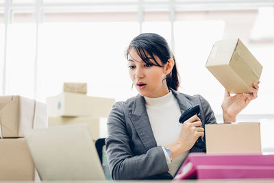 Young woman using smart phone