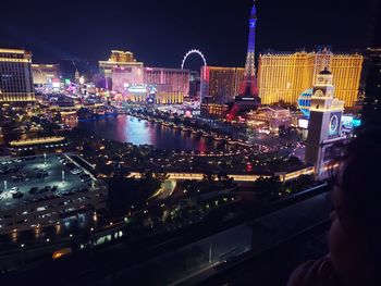 Illuminated city buildings at night