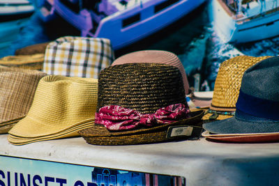 Rear view of woman wearing hat on table